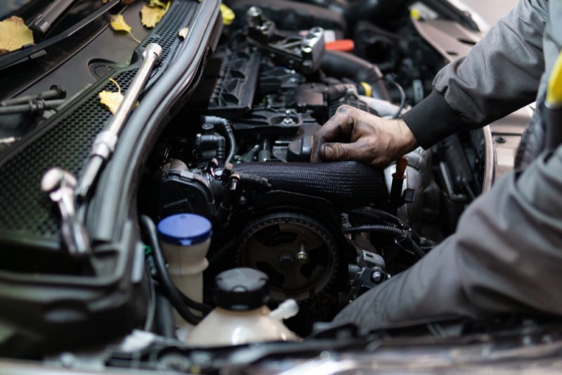 Hands-on service work on a Mercedes engine